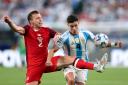 Canada right-back Alistair Johnston, left, tackles Julian Alvarez of Argentina in the Copa America semi-final on Tuesday night