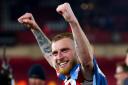 Oli McBurnie celebrates being promoted to the English Premier League after winning the Championship with Sheffield United in 2023