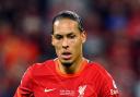 Liverpool superstar Virgil van Dijk links up with Giovanni van Bronckhorst at Rangers pre-season camp