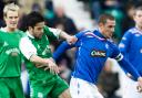 Barry Ferguson holds off Merouane Zemmama