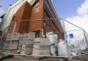 Scheduled building work in the Copland Road stand has hit delays