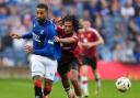 Manchester United's Hannibal Mejbri battle for the ball with Rangers’ Connor Goldson