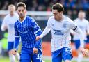 Scott Wright gets away from St Johnstone's David Keltjens