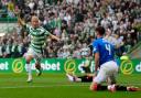 Celtic's Daizen Maeda (left) celebrates after scoring