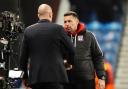 Lyon manager Pierre Sage and Rangers manager Philippe Clement shake hands at full-time