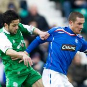 Barry Ferguson holds off Merouane Zemmama