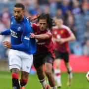 Manchester United's Hannibal Mejbri battle for the ball with Rangers’ Connor Goldson