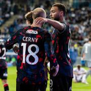 Rangers' Cyriel Dessers (R) celebrates with Vaclav Cerny