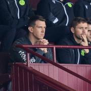 Ryan Jack sits next to some of Motherwell's players at Fir Park