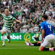 Celtic's Daizen Maeda (left) celebrates after scoring