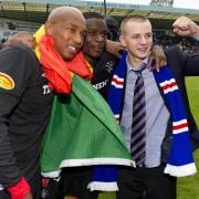 15/05/11 CLYDESDALE BANK PREMIER LEAGUEKILMARNOCK v RANGERS (1-5)RUGBY PARK - KILMARNOCKRangers players (left to right) El Hadji Diouf, Maurice Edu and Vladimir Weiss celebrate after clinching the SPL title