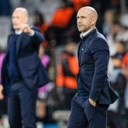 Malmo manager Henrik Rydstrom stands on the touchline with Rangers’ Philippe Clement