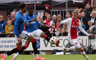Connor Goldson and Dujon Sterling battle with Ajax's Kenneth Taylor