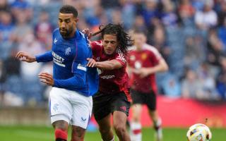 Manchester United's Hannibal Mejbri battle for the ball with Rangers’ Connor Goldson