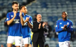 The manager and players clap the fans