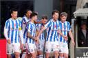 Marley Watkins celebrates the winner with his Kilmarnock teammates