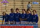 The Rangers squad line up in a wall as the game is broadcast on Iraqi TV