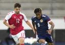 Dapo Mebude in action for Scotland