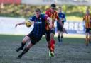 GLASGOW, SCOTLAND - MARCH 19: Hamilton's Brian Easton holds off Partick's Juan Alegría during a cinch Championship match between Partick Thistle and Hamilton Academical at Firhill Stadium, on March 19, 2022, in Glasgow, Scotland. (Photo by Mark Scates /