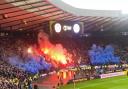 Both teams supporters set off pyrotechnics prior to kick-off