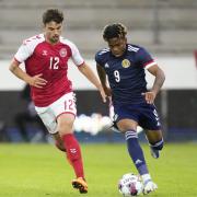 Dapo Mebude in action for Scotland