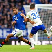 Rangers' Cyriel Dessers and Dynamo Kyiv's Taras Mykhavko battle for the ball