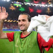 HAMBURG, GERMANY - JUNE 26: Yusuf Yazici of Turkiye celebrates after the team's qualification to the knockout stages during the UEFA EURO 2024 group stage match between Czechia and Turkiye at Volksparkstadion on June 26, 2024 in Hamburg, Germany. (Photo