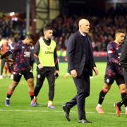 Philippe Clement and his Rangers players look dejected at Pittodrie