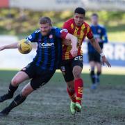 GLASGOW, SCOTLAND - MARCH 19: Hamilton's Brian Easton holds off Partick's Juan Alegría during a cinch Championship match between Partick Thistle and Hamilton Academical at Firhill Stadium, on March 19, 2022, in Glasgow, Scotland. (Photo by Mark Scates /