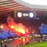 Both teams supporters set off pyrotechnics prior to kick-off