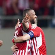 Olympiacos' Ayoub El Kaabi celebrates scoring their side's second goal of the game during the UEFA Europa Conference League semi-final against Aston Villa.