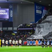 GLASGOW, SCOTLAND - NOVEMBER 10: The teams observe a minutes silence ahead of kick off for Remembrance Sunday during a William Hill Scottish Premiership match between Rangers and Heart of Midlothian at Ibrox Stadium, on November 10, 2024, in Glasgow,